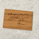 Engraved wooden board with handwritten message that says I love you very very much Love Mom