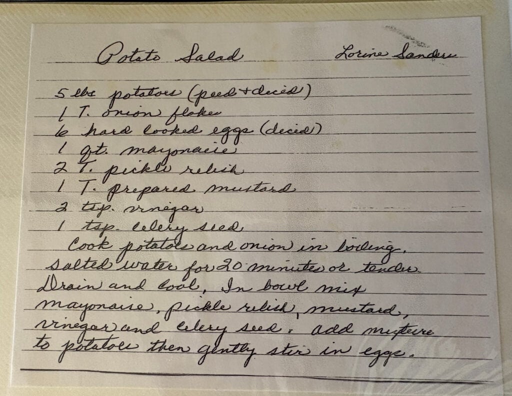 handwritten vintage potato salad recipe card with cursive handwriting on lined paper
